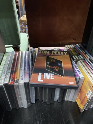 Lot 143 - A LOT OF BOB DYLAN AND TOM PETTY CDS AND DVDS