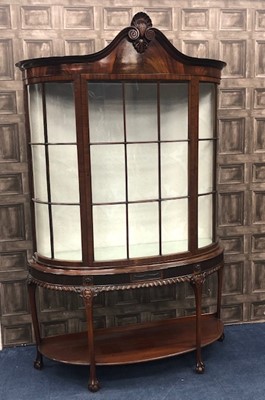 Lot 1651 - A MAHOGANY BOW FRONT DISPLAY CABINETOF CHIPPENDALE DESIGN