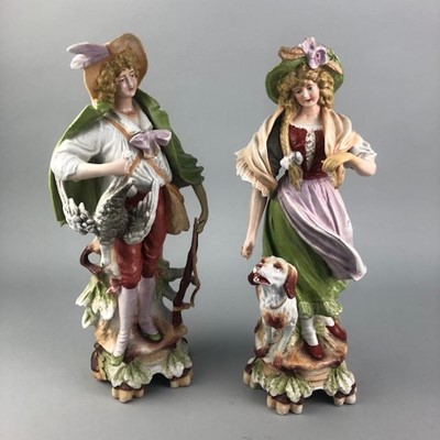 Lot 91 - A PAIR OF TWIN HANDLED VASES AND TWO CERAMIC FIGURES