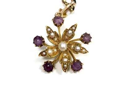Lot 1401 - AN EDWARDIAN PURPLE GEM SET AND PEARL PENDANT ON CHAIN