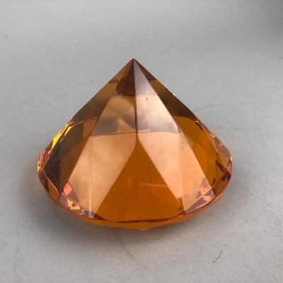 Lot 5 - A ROSENTHAL AMBER GLASS MODEL DIAMOND AND THREE PAPERWEIGHTS