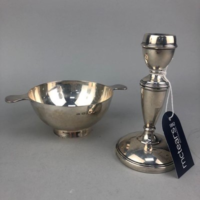 Lot 6 - A SILVER QUAICH AND A SILVER CANDLESTICK