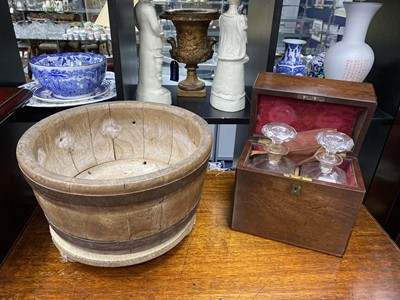 Lot 310 - A MAHOGANY TWO BOTTLE TANTALUS AND A BARREL SHAPED BOWL