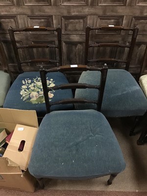 Lot 231 - A LOT OF THREE MAHOGANY LADDER BACK DINING CHAIRS