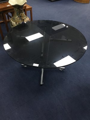 Lot 261 - A CHROME COFFEE TABLE WITH CIRCULAR SMOKED GLASS TOP
