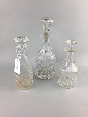 Lot 286 - A LOT OF FOUR CRYSTAL AND GLASS DECANTERS AND TWO GLASS JARS