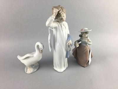 Lot 287 - A NAO FIGURE OF A CHILD AND TWO OTHER NAO FIGURES