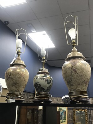 Lot 302 - A PAIR OF FLORAL AND GILT TABLE LAMPS AND ANOTHER LAMP