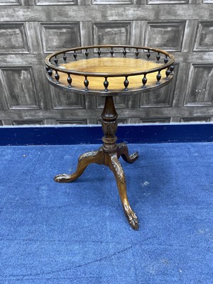 Lot 315 - A MAHOGANY CARVED WOOD CIRCULAR TEA TABLE