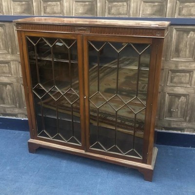 Lot 150 - AN EARLY 20TH CENTURY MAHOGANY TWO DOOR BOOKCASE