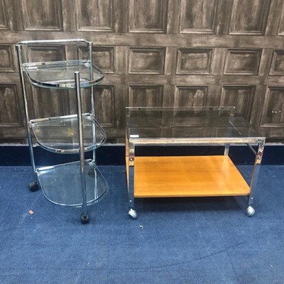 Lot 161 - A GLASS AND METAL TROLLEY AND AN OCCASIONAL TABLE