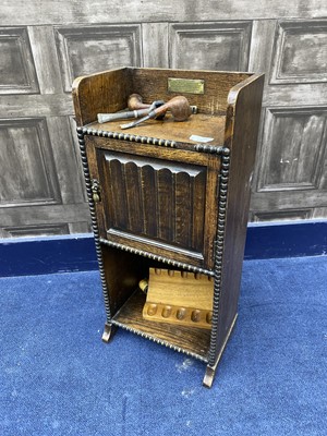 Lot 158 - AN EARLY 20TH CENTURY OAK SMOKER'S CABINET