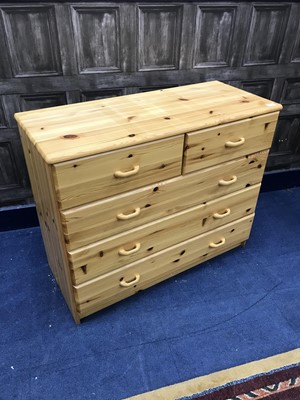 Lot 157 - A MODERN PINE CHEST OF DRAWERS, A BEDSIDE CHEST AND A MIRROR