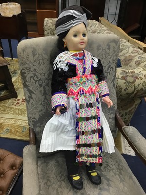 Lot 36 - A 20TH CENTURY PLASTIC DOLL IN TRADITIONAL HMONG DRESS