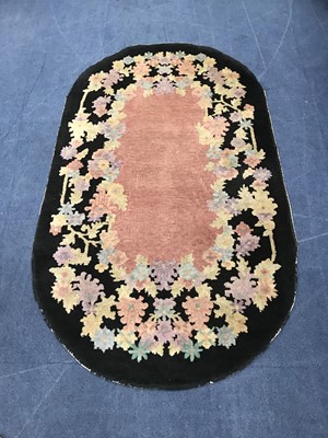 Lot 37 - A GROUP OF THREE FLORAL DECORATED OVAL RUGS