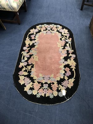 Lot 37 - A GROUP OF THREE FLORAL DECORATED OVAL RUGS