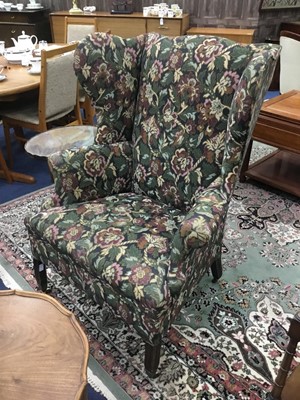 Lot 128 - A WING BACK ARMCHAIR