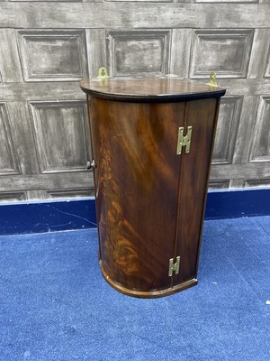 Lot 311 - A MAHOGANY WALL MOUNTING BOW FRONTED CORNER CUPBOARD