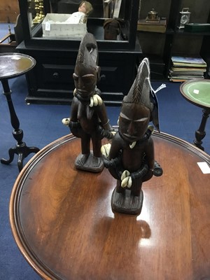 Lot 14 - A LOT OF YORUBAN WOOD CARVINGS OF TWINS AND AN AFRICAN MASK