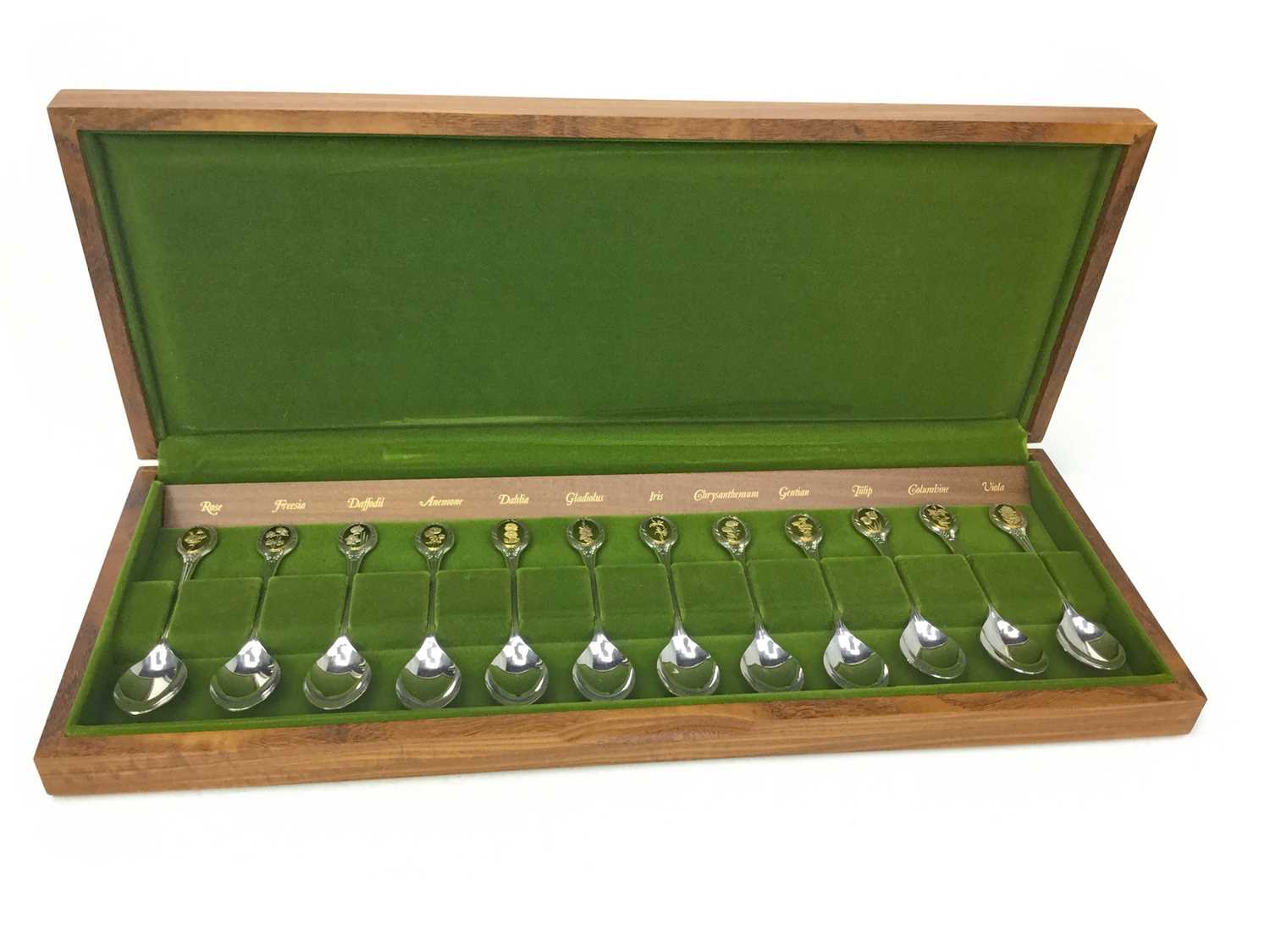 Lot 501 - A SET OF TWELVE ROYAL HORTICULTURAL SOCIETY SILVER SPOONS