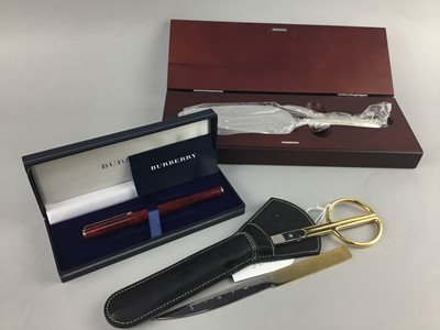 Lot 78 - A MODERN SILVER HANDLED CAKE KNIFE, BURBERRY PEN AND DESK TIDY