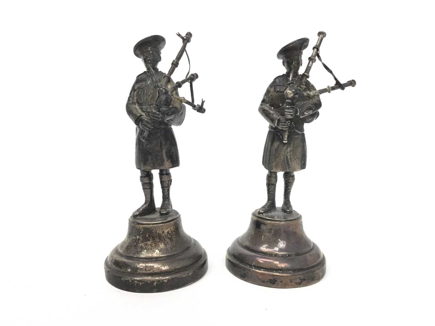 Lot 401 - A PAIR OF SILVER FIGURES OF BAGPIPERS