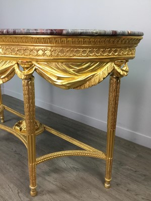 Lot 1203 - A LATE 19TH CENTURY GILTWOOD DEMI LUNE CONSOLE TABLE OF LOUIS XVI DESIGN