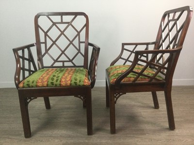 Lot 1215 - AN ATTRACTIVE NEAR PAIR OF GEORGE III CHINESE CHIPPENDALE MAHOGANY ELBOW CHAIRS