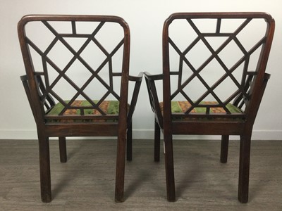 Lot 1215 - AN ATTRACTIVE NEAR PAIR OF GEORGE III CHINESE CHIPPENDALE MAHOGANY ELBOW CHAIRS