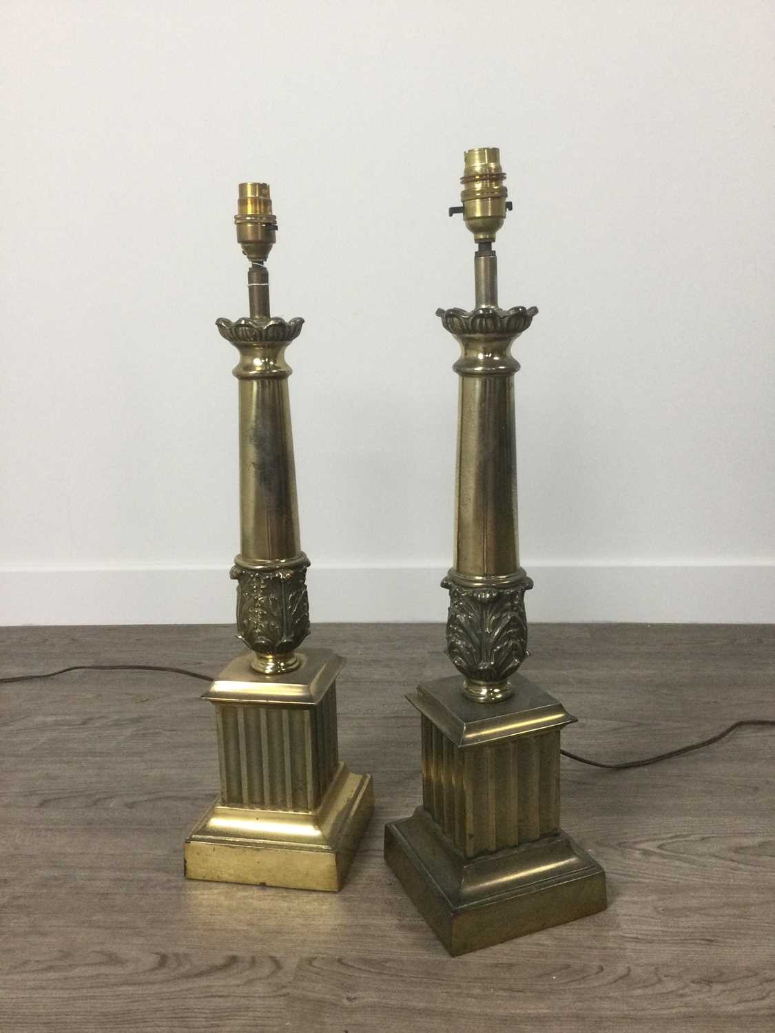 Lot 1225 - A PAIR OF EARLY 20TH CENTURY BRASS COLUMN TABLE LAMPS