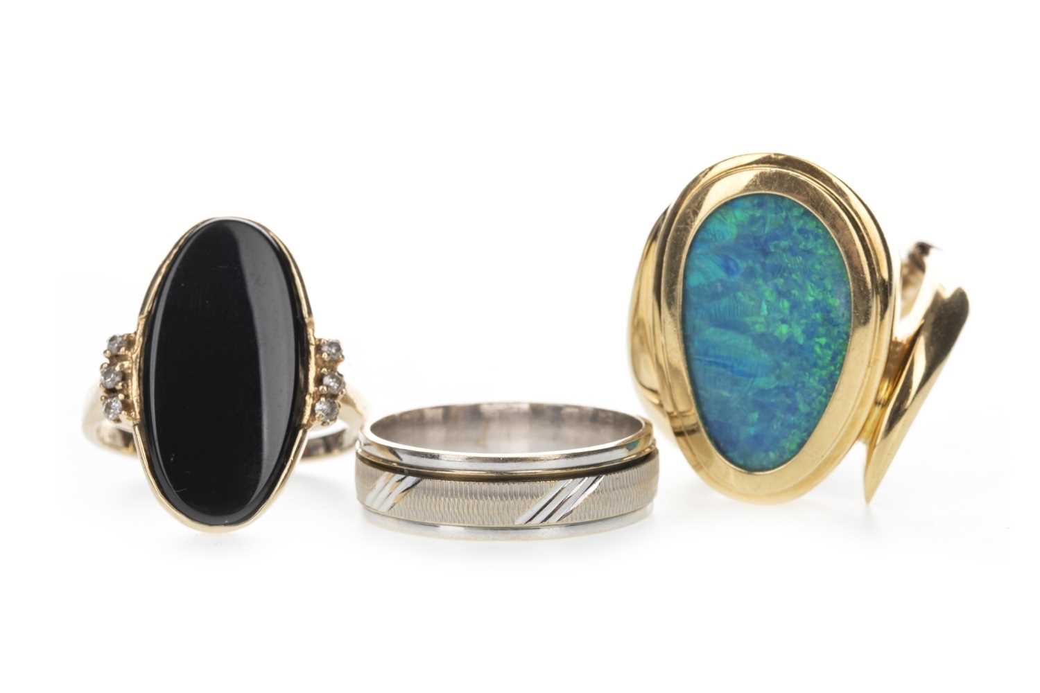 Lot 403 - AN OPAL DOUBLET RING, BLACK HARDSTONE RING AND A WEDDING BAND