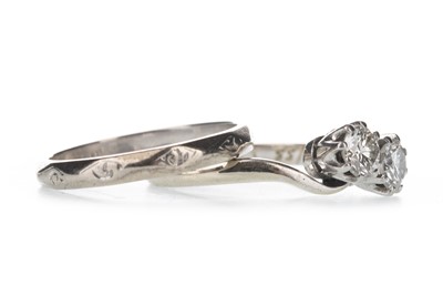 Lot 429 - A DIAMOND TWO STONE RING AND A WEDDING BAND