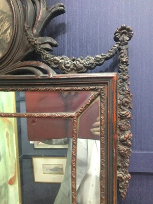 Lot 1384 - A PAINTED AND LACQUERED WALL MIRROR