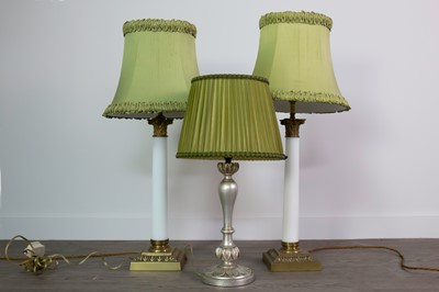 Lot 1381 - A PAIR OF OPAQUE GLASS AND BRASS CORINTHIAN PILLAR TABLE LAMPS, ALONG WITH ANOTHER TABLE LAMP