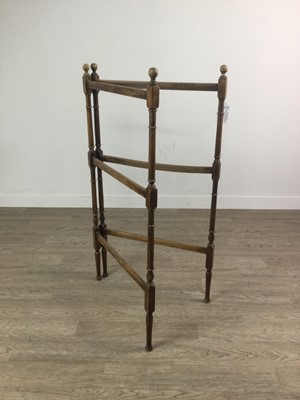 Lot 1292 - A MAHOGANY FOLDING TOWEL RAIL AND A FOLDING TABLE AND