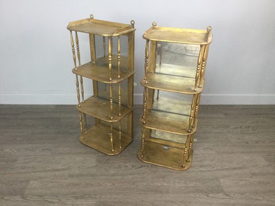 Lot 1269 - A PAIR OF VICTORIAN GILT PAINTED HANGING WALL SHELVES