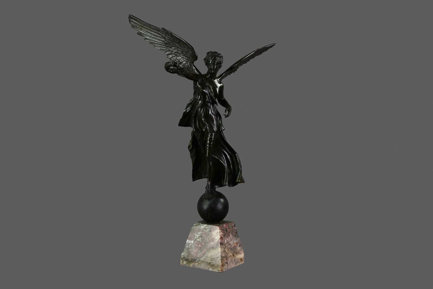 Lot 1306 - A 19TH CENTURY BRONZED METAL FIGURE OF NIKE