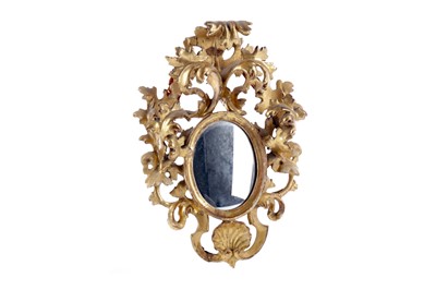 Lot 1350 - A PAIR OF VICTORIAN SMALL OVAL WALL MIRRORS IN FLORENTINE FRAMES