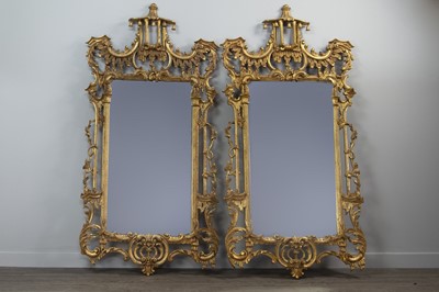 Lot 1349 - A PAIR OF GILT UPRIGHT WALL MIRRORS OF CHIPPENDALE DESIGN