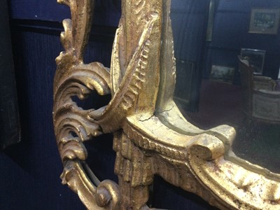 Lot 1349 - A PAIR OF GILT UPRIGHT WALL MIRRORS OF CHIPPENDALE DESIGN