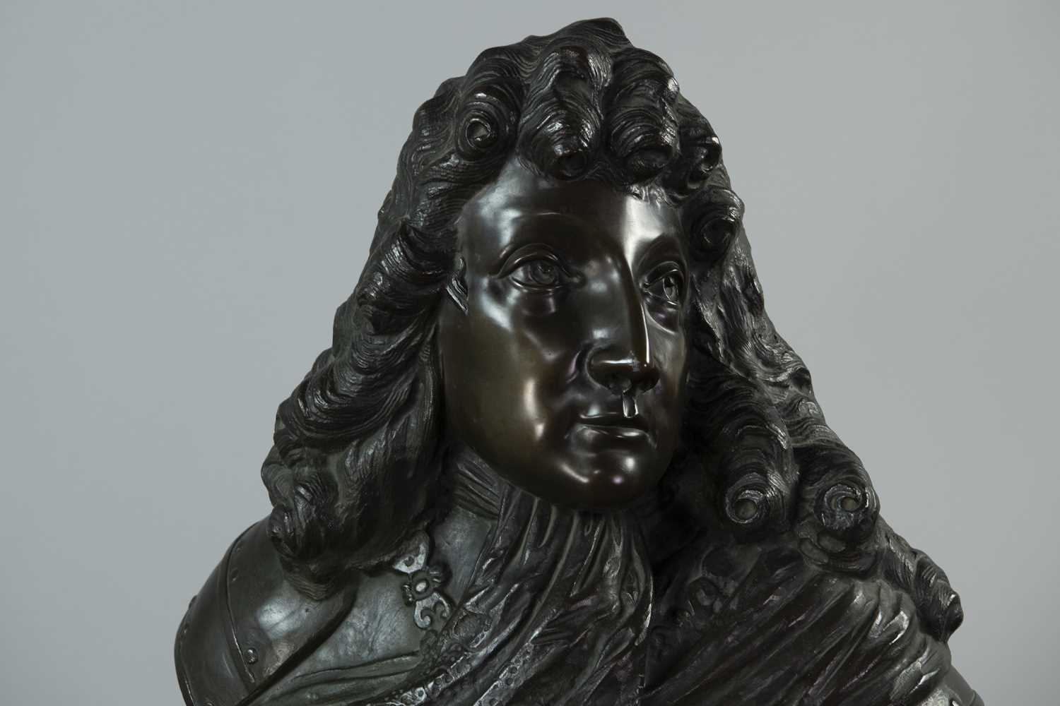 Lot 1344 - A 19TH CENTURY BRONZE BUST OF  LOUIS XIV