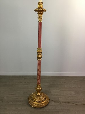 Lot 1336 - A MOULDED GILTWOOD AND CRIMSON DAMASK MOUNTED FLOOR LAMP