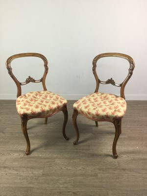 Lot 1329 - A PAIR OF VICTORIAN WALNUT BALLOON BACK SINGLE CHAIRS