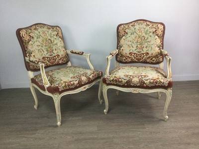 Lot 1321 - A PAIR OF CREAM AND GILT PAINTED FAUTEUILS