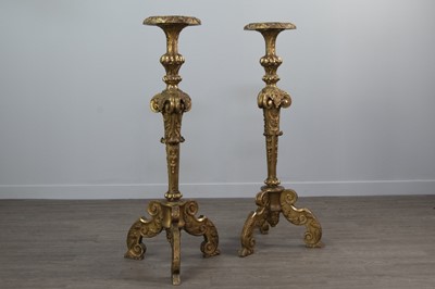 Lot 1318 - A PAIR OF 19TH CENTURY BAROQUE STYLE GILTWOOD TORCHERES