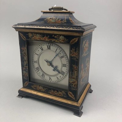 Lot 221 - A MANTEL CLOCK