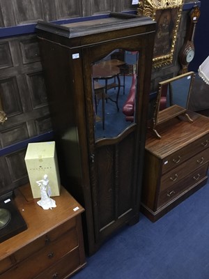 Lot 261 - AN OAK HALL WARDROBE