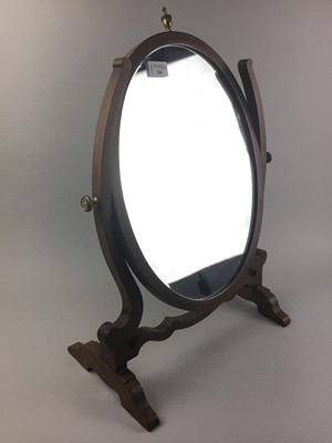 Lot 266 - A MAHOGANY UPRIGHT OVAL DRESSING MIRROR