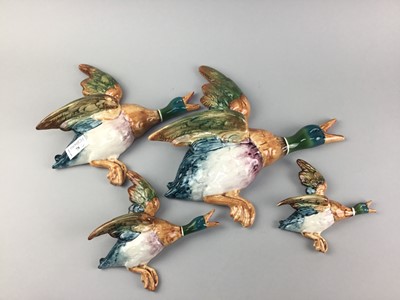 Lot 78 - A GRADUATED SET OF FOUR BESWICK CERAMIC WALL MOUNTING MODELS OF DUCKS