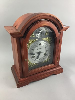 Lot 125 - A VINTAGE MANTEL CLOCK AND A DRESSING MIRROR